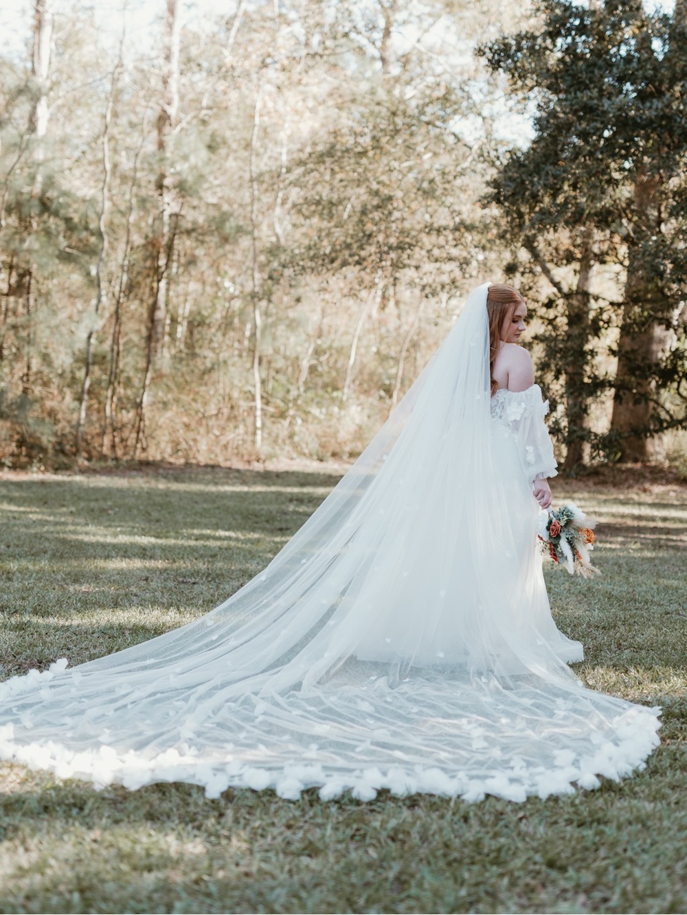 Elegant White Bridal Veil with Floral Edge and wedding dress